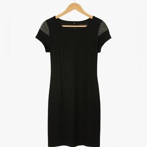 Alfani size 8 black dress with silver shoulder accents. Polyester/Rayon Blend